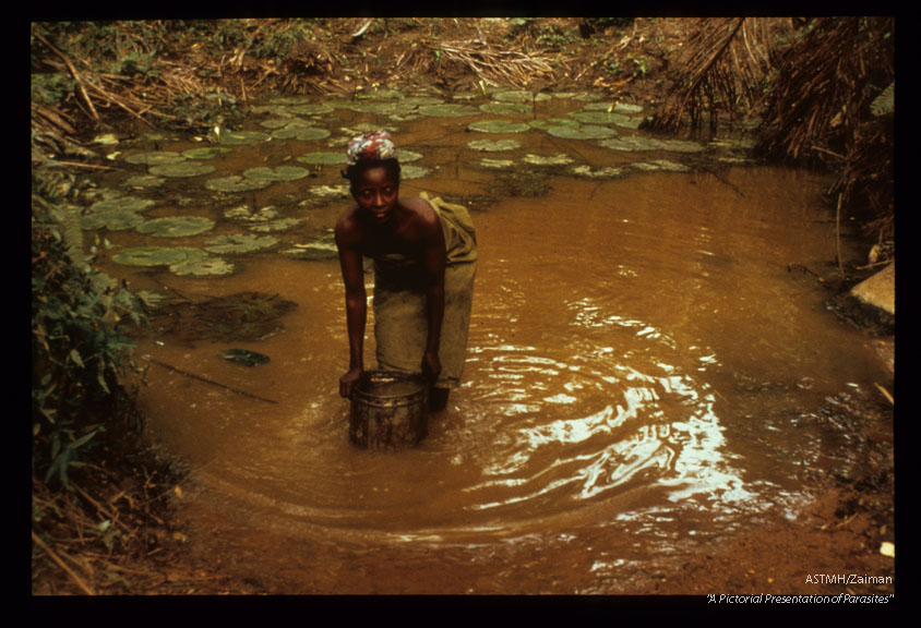 Collecting drinking water at a transmission site.